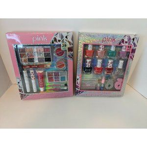 Two Pink Make Up Sets On For Face And One For Nails